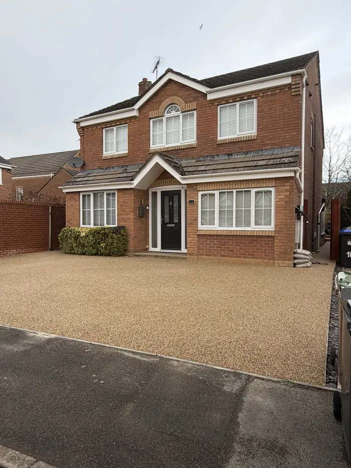 Beige resin bound driveway to a detached house in Daventry, by A&P Resin