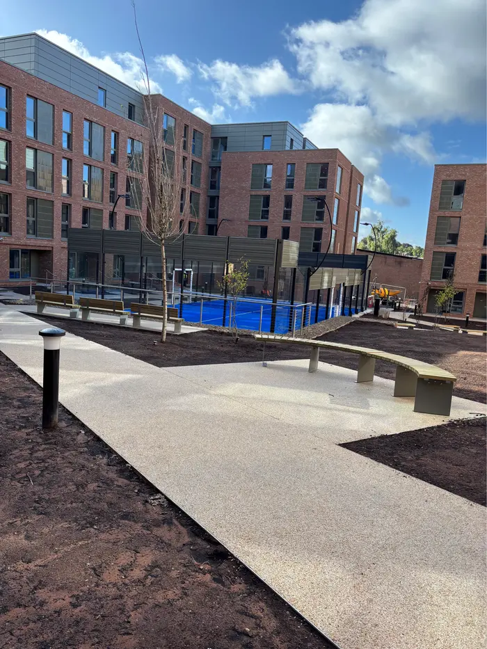 Resin bound paths and lawns in a new-build apartment courtyard, by A&P Resin