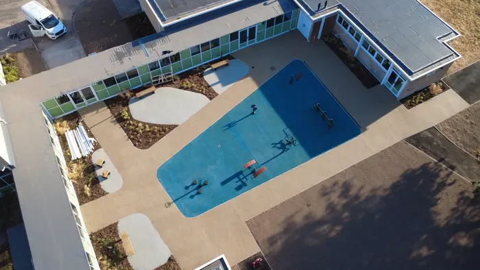 Aerial view of a resin bound pool surround, by A&P Resin