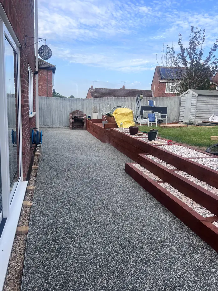 Grey resin bound garden path with matching steps, by A&P Resin