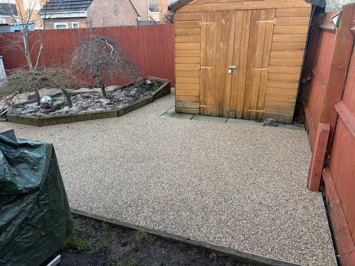 Resin bound patio around a garden shed, by A&P Resin