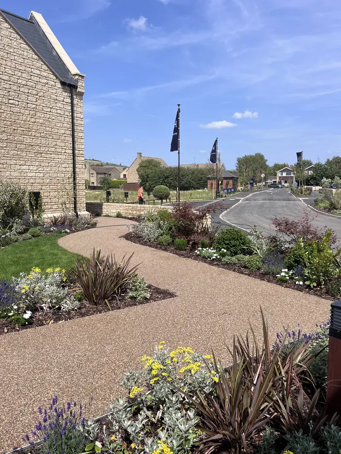 Resin bound front garden path with flower beds, by A&P Resin